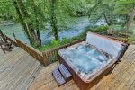 Look out over the river as you enjoy the hot tub